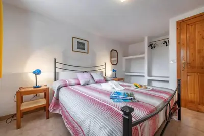 Letto o letti in una camera di Beachside apartment for a relaxing holiday