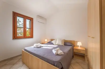 Letto o letti in una camera di Spacious flat 300mt from the beach