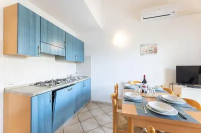 Cucina o angolo cottura di Spacious flat 300mt from the beach