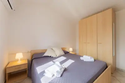 Letto o letti in una camera di Spacious flat 300mt from the beach