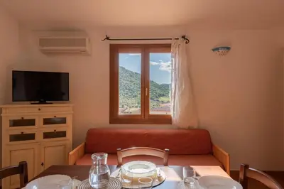 TV o dispositivi per l'intrattenimento presso Cozy flat surrounded by nature