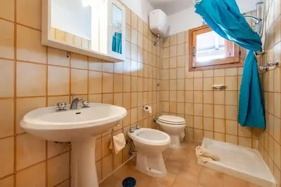 Bagno di Cozy apartment 150m from Pittulongu beach