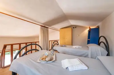 Letto o letti in una camera di Relaxing apartment with outdoor dining
