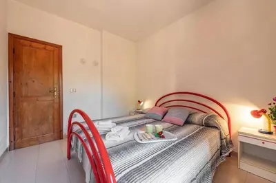 Letto o letti in una camera di Perfectly located flat in San Teodoro