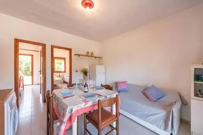 Cucina o angolo cottura di Perfectly located flat in San Teodoro