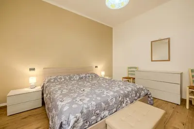 Letto o letti in una camera di AD House