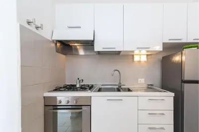 Cucina o angolo cottura di Il Vecchio Faro Carolina - Happy Rentals
