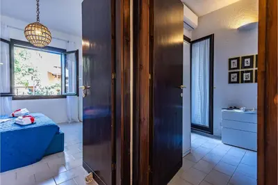 Letto o letti in una camera di Il Vecchio Faro Carolina - Happy Rentals