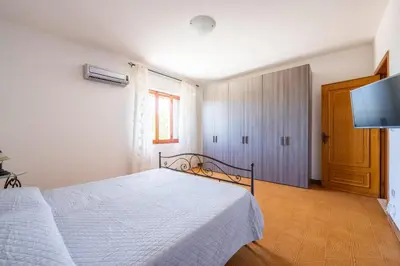 Letto o letti in una camera di Villa Antonina & Mino