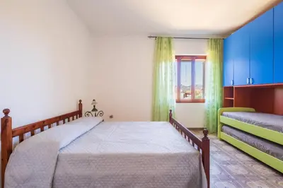 Letto o letti in una camera di Villa Antonina & Mino