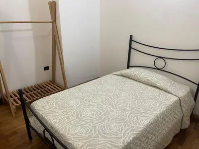 Letto o letti in una camera di Casa Frau