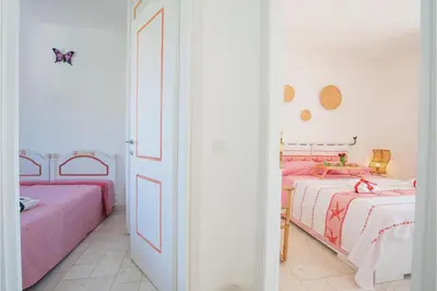 Letto o letti in una camera di Apposentu - Happy Rentals