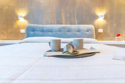 Letto o letti in una camera di la maison dorée