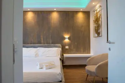 Letto o letti in una camera di la maison dorée