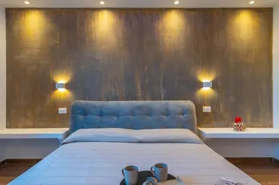Letto o letti in una camera di la maison dorée