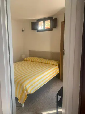 Letto o letti in una camera di Casa Elicriso
