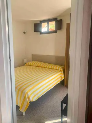 Letto o letti in una camera di Casa Elicriso