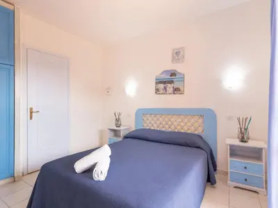 Letto o letti in una camera di Relax on the Bay of Marinella