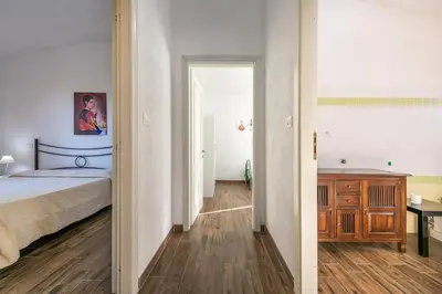 Letto o letti in una camera di AffittaSardegna - Appartamenti Appentos