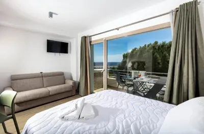 Letto o letti in una camera di Blue Bay rooms