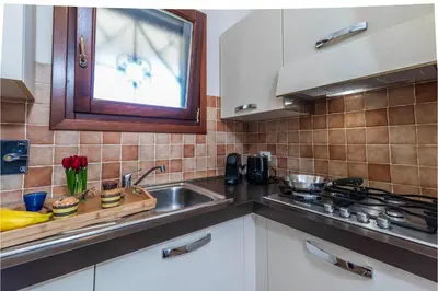 Cucina o angolo cottura di Sweet Home Tavolara - Happy Rentals