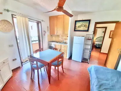 Cucina o angolo cottura di Apartment 4 beds in Marinella just 100 mt from the beach