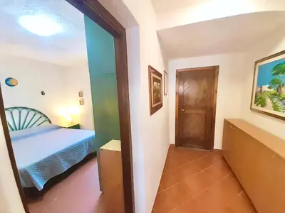 Letto o letti in una camera di Apartment 4 beds in Marinella just 100 mt from the beach