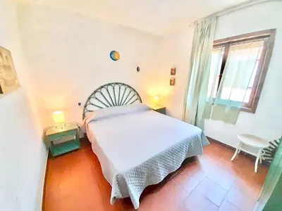 Letto o letti in una camera di Apartment 4 beds in Marinella just 100 mt from the beach