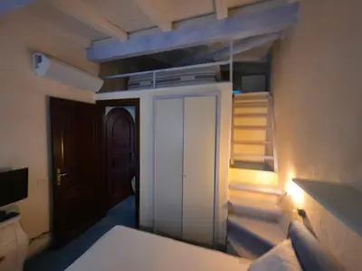 Letto o letti in una camera di Dimora delle Lucine di Puntaldia