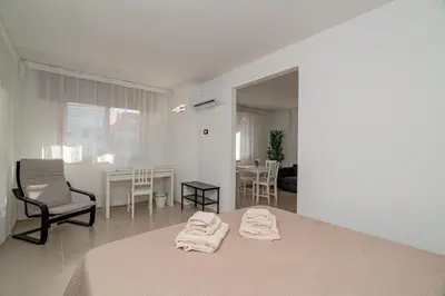 Letto o letti in una camera di Domo Le Mura Puniche, Centro di Olbia