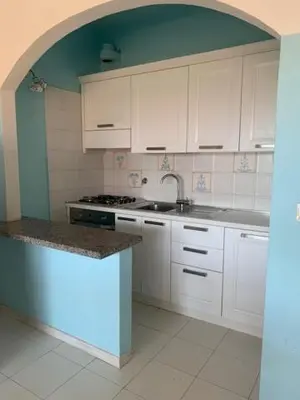 Cucina o angolo cottura di Residence Porto Coda Cavallo