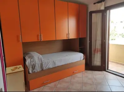 Letto o letti in una camera di Appartamento Siniscola