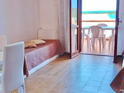 Letto o letti in una camera di Apartment 6 beds in Marinella just 300 mt from the beach