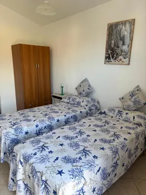 Letto o letti in una camera di Villa Pierina