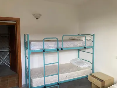 Letto o letti in una camera di Gelsomino