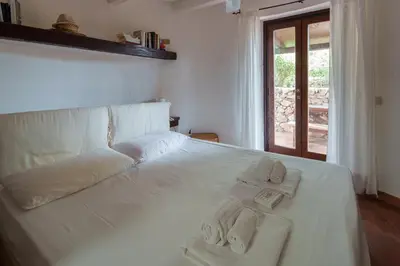 Letto o letti in una camera di Villa Oleandra