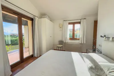 Letto o letti in una camera di Villa Oleandra