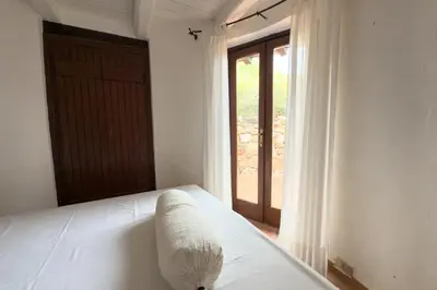 Letto o letti in una camera di Villa Oleandra