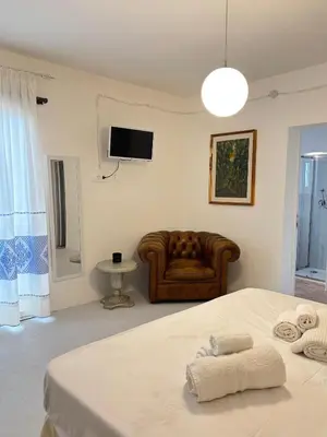 Letto o letti in una camera di Domo Nea