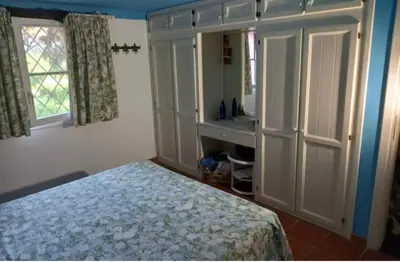 Letto o letti in una camera di Villa Graziella