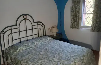 Letto o letti in una camera di Villa Graziella