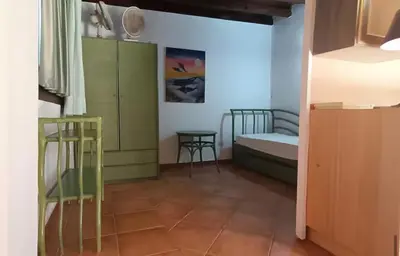 Letto o letti in una camera di Villa Graziella
