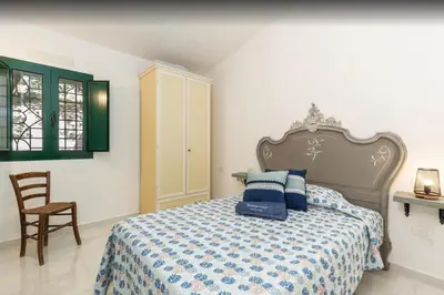 Letto o letti in una camera di Residenze Corallo Charme e Relax