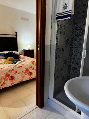 Letto o letti in una camera di Residenze Corallo Charme e Relax