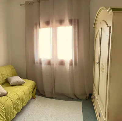 Letto o letti in una camera di Casa Vacanza Elisa