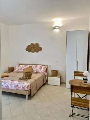 Letto o letti in una camera di Deriu Rooms