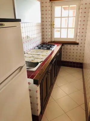 Cucina o angolo cottura di Le Rose di Porto Taverna 80 mt spiaggia