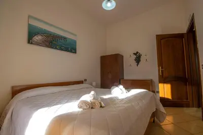 Letto o letti in una camera di Villa Mirto 1