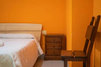 Letto o letti in una camera di Le due palme