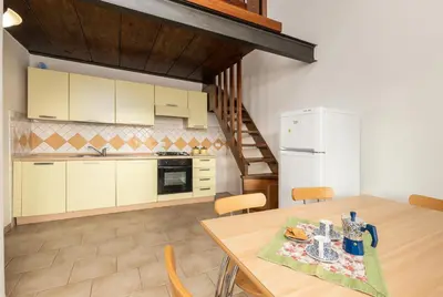 Cucina o angolo cottura di Residenze Corallo - Cala Liberotto